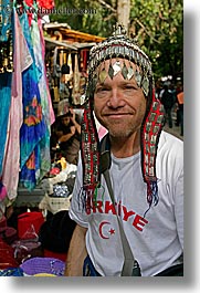 dans, europe, groups, head dress, men, people, shirts, tourists, turkeys, vertical, photograph