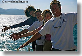 europe, groups, hands, horizontal, laugh, ocean, people, tourists, turkeys, womens, photograph