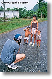 cameras, caribbean, cuba, dan jill, dans, havana, island nation, islands, latin america, people, south america, vertical, photograph