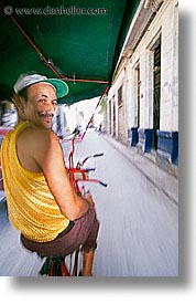 bicycles, caribbean, cuba, havana, island nation, islands, latin america, men, people, south america, taxis, vertical, photograph