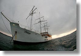 boats, ecuador, equator, eve, evening, fisheye lens, galapagos, galapagos islands, heritage, horizontal, islands, latin america, ocean, pacific ocean, south pacific, water, photograph