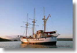 afloat, boats, ecuador, equator, galapagos, galapagos islands, horizontal, islands, latin america, ocean, pacific ocean, sagitta, sails down, south pacific, water, photograph