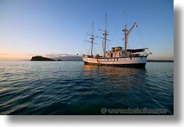 afloat, boats, ecuador, equator, galapagos, galapagos islands, horizontal, islands, latin america, ocean, pacific ocean, sagitta, sails down, south pacific, water, photograph