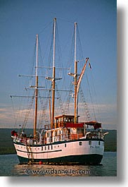 afloat, boats, ecuador, equator, galapagos, galapagos islands, islands, latin america, ocean, pacific ocean, sagitta, sails down, south pacific, vertical, water, photograph