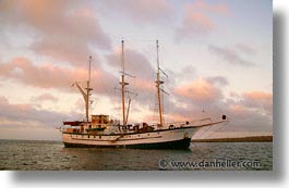 afloat, boats, ecuador, equator, galapagos, galapagos islands, horizontal, islands, latin america, ocean, pacific ocean, sagitta, sails down, south pacific, water, photograph