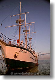 afloat, boats, ecuador, equator, galapagos, galapagos islands, islands, latin america, ocean, pacific ocean, sagitta, sails down, south pacific, vertical, water, photograph