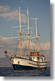 afloat, boats, ecuador, equator, galapagos, galapagos islands, islands, latin america, ocean, pacific ocean, sagitta, sails down, south pacific, vertical, water, photograph