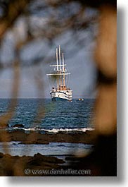 boats, ecuador, equator, galapagos, galapagos islands, islands, latin america, ocean, pacific ocean, sagitta, sails down, south pacific, trees, vertical, water, photograph