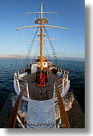 boats, ecuador, equator, fisheye, fisheye lens, galapagos, galapagos islands, islands, latin america, ocean, pacific ocean, sagitta, sails up, south pacific, vertical, water, photograph