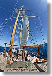 boats, ecuador, equator, fisheye lens, galapagos, galapagos islands, islands, latin america, ocean, pacific ocean, sagitta, sails, sails up, south pacific, vertical, water, photograph