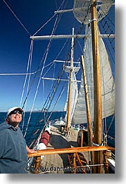 boats, ecuador, equator, galapagos, galapagos islands, islands, latin america, ocean, pacific ocean, sagitta, sails, sails up, south pacific, vertical, water, photograph