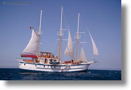boats, ecuador, equator, galapagos islands, horizontal, latin america, sagitta, sails, sails up, photograph