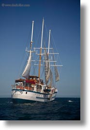 boats, ecuador, equator, galapagos islands, latin america, sagitta, sails, sails up, vertical, photograph