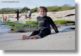 beaches, ecuador, equator, galapagos islands, horizontal, jacks, latin america, natural habitat, ocean, people, sand, tourists, wetsuit, photograph