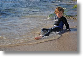 beaches, ecuador, equator, galapagos islands, horizontal, jacks, latin america, natural habitat, ocean, people, sand, tourists, wetsuit, photograph