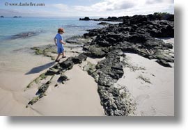 baseball cap, beaches, ecuador, equator, galapagos islands, horizontal, jacks, latin america, natural habitat, ocean, people, sand, tourists, photograph