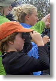 baseball cap, ecuador, equator, galapagos islands, jacks, latin america, natural habitat, people, tourists, vertical, viewing, viewing wildlife, wildlife, photograph