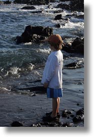 baseball cap, beaches, ecuador, equator, galapagos islands, jacks, latin america, natural habitat, ocean, people, rocks, tourists, vertical, water, photograph