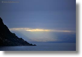 cliffs, ecuador, equator, galapagos islands, horizontal, latin america, santa cruz, sunbeams, photograph