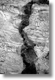 black and white, cliffs, dike, ecuador, equator, galapagos islands, latin america, santa cruz, vertical, volcanic, photograph