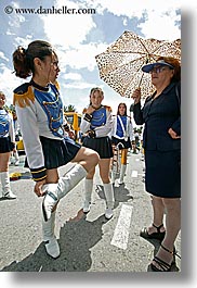 images/LatinAmerica/Ecuador/Quito/Women/majorette-n-woman-w-umbrella.jpg