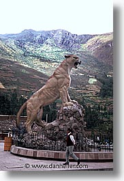 ancient ruins, andes, architectural ruins, inca trail, incan tribes, latin america, mountains, peru, pisac, puma, statues, stone ruins, vertical, photograph