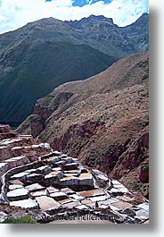 ancient ruins, andes, architectural ruins, inca trail, incan tribes, latin america, maras, mountains, peru, salineras, salt flats, stone ruins, vertical, photograph