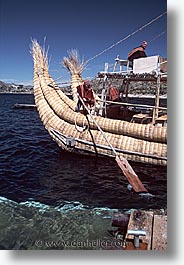 boats, bolivia, bolivia/peru border, highest lake in the world, lakes, latin america, peru, peru border, reed, reed boats, titicaca, vertical, photograph