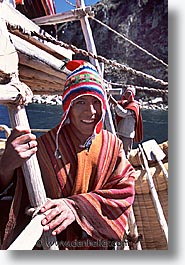 boats, bolivia, bolivia/peru border, highest lake in the world, lakes, latin america, peru, peru border, reed, reed boats, titicaca, vertical, photograph