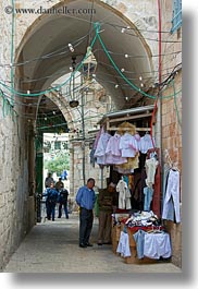 archways, clothes, hangings, israel, jerusalem, merchandise, middle east, vertical, photograph
