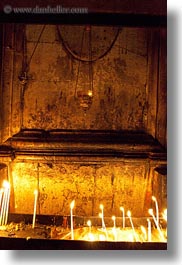 buildings, candles, catholic, churches, glow, holy sepulchre, israel, jerusalem, lamps, lights, middle east, religious, religious sites, structures, vertical, walls, photograph