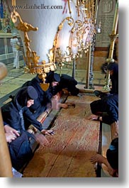 buildings, catholic, churches, holy sepulchre, israel, jerusalem, middle east, religious, religious sites, stones, structures, unction, vertical, photograph