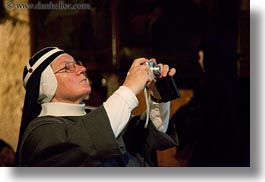 images/MiddleEast/Israel/Jerusalem/ReligiousSites/MarysTomb/nun-w-camera.jpg