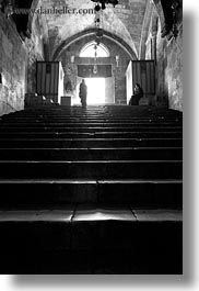 black and white, buildings, catholic, christian, churches, glow, israel, jerusalem, lights, marys tomb, middle east, nuns, religious, religious sites, stairs, structures, vertical, walking, photograph