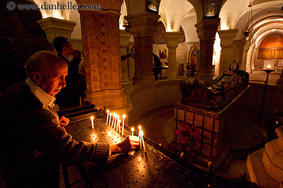 old-man-lighting-candle-n-sleeping-mary.jpg