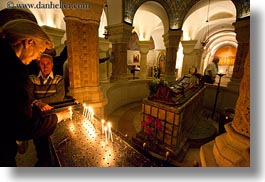 images/MiddleEast/Israel/Jerusalem/ReligiousSites/Misc/woman-lighting-candles-n-sleeping-mary.jpg