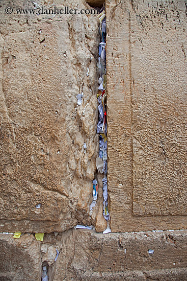 prayers-stuffed-in-stone-wall.jpg
