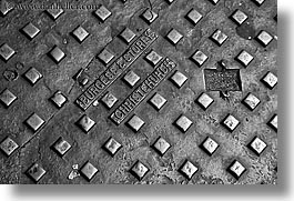 black and white, christchurch, covers, horizontal, manholes, new zealand, photograph