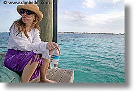 bahamas, capital, capital city, caribbean, cities, dan jill, dock, horizontal, island-nation, islands, jills, nassau, nation, resort, royal bahamian, sandals, sitting, tropics, vacation, photograph