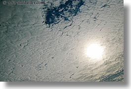 images/UnitedStates/Alaska/Misc/clouds-sun-helicopter.jpg