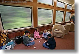alaska, america, cards, girls, horizontal, north america, playing, slow exposure, trains, united states, photograph