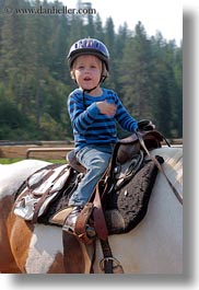 activities, america, clothes, emotions, happy, hats, helmets, horseback riding, horses, idaho, jacks, north america, red horse mountain ranch, riding, smiles, united states, vertical, photograph