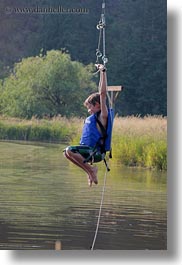 america, boys, childrens, idaho, lakes, north america, over, people, red horse mountain ranch, swinging, united states, vertical, photograph
