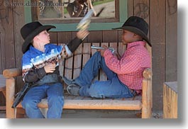 america, boys, childrens, clothes, cowboy hat, guns, hats, horizontal, idaho, north america, people, red horse mountain ranch, united states, photograph