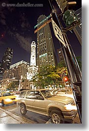 america, buildings, cars, chicago, cityscapes, illinois, long exposure, nite, north america, streets, towers, united states, vertical, water, water towers, photograph