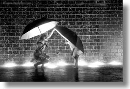 america, black and white, bricks, chicago, crown fountains, glow, horizontal, illinois, jacks, jills, lights, materials, millenium park, nite, north america, rain, umbrellas, united states, weather, photograph