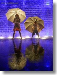 america, bricks, chicago, crown fountains, glow, illinois, jacks, jills, lights, materials, millenium park, nite, north america, rain, umbrellas, united states, vertical, weather, photograph