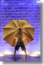 america, bricks, chicago, crown fountains, glow, illinois, jacks, lights, materials, millenium park, nite, north america, rain, umbrellas, united states, vertical, weather, photograph