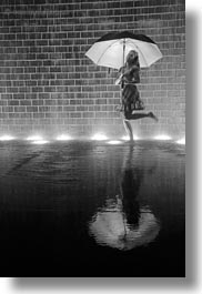 america, black and white, bricks, chicago, crown fountains, glow, illinois, jills, lights, materials, millenium park, nite, north america, rain, umbrellas, united states, vertical, weather, photograph