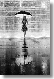 america, black and white, bricks, chicago, crown fountains, glow, illinois, jills, lights, materials, millenium park, nite, north america, rain, umbrellas, united states, vertical, weather, photograph